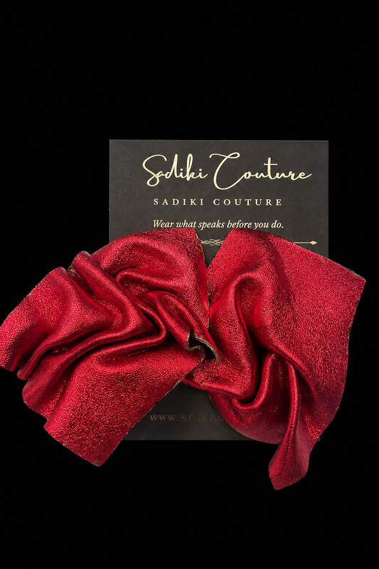 Red leather earrings with black background on Sadiki Couture earring card